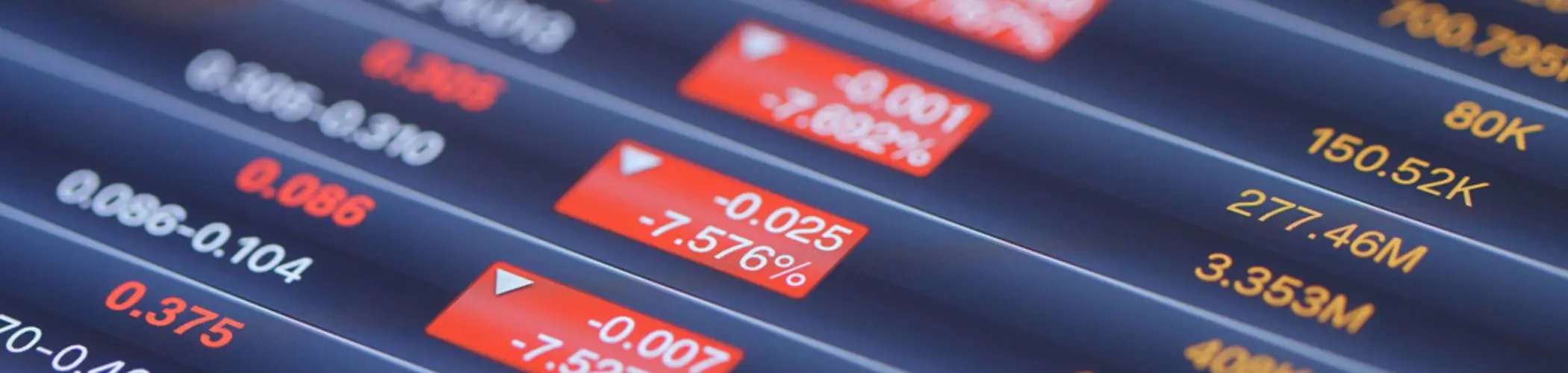 Financial market board showing declining indicators with red figures, illustrating volatility and market losses
