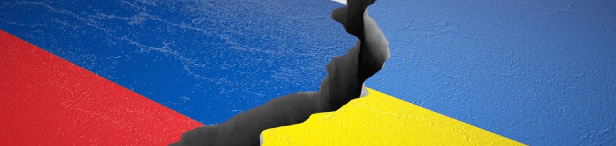 Russian and Ukrainian flags separated by a crack, illustrating geopolitical tensions and international conflict
